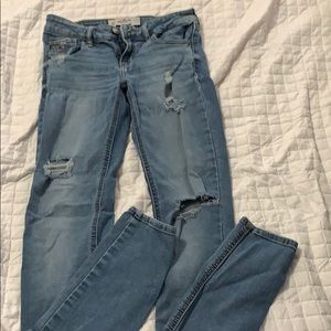 Hollister medium wash destroyed skinny jeans